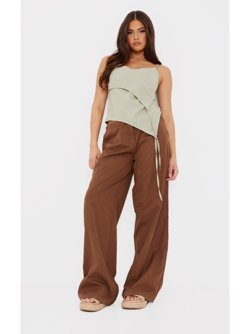 Зелений лляний асиметричний топ на бретельках з лямками