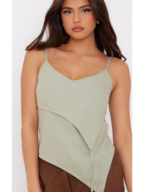 Зелений лляний асиметричний топ на бретельках з лямками