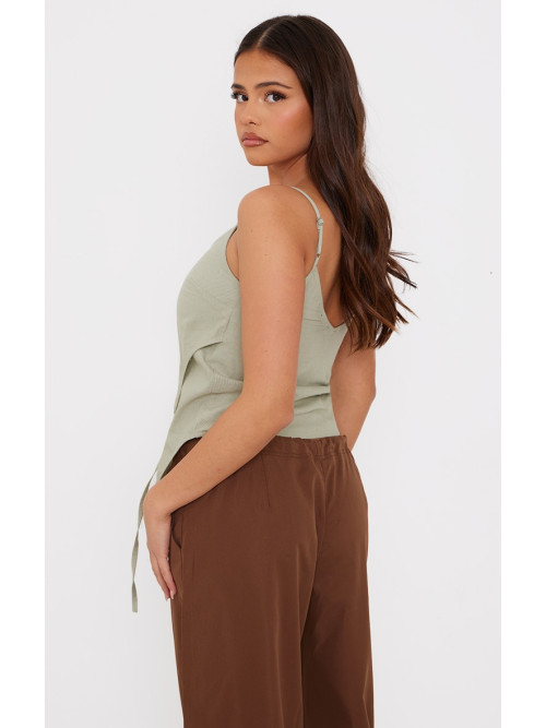 Зелений лляний асиметричний топ на бретельках з лямками