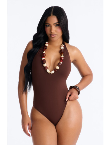 Боді з глибоким V-подібним вирізом та зав'язками на шиї, розшите бісером