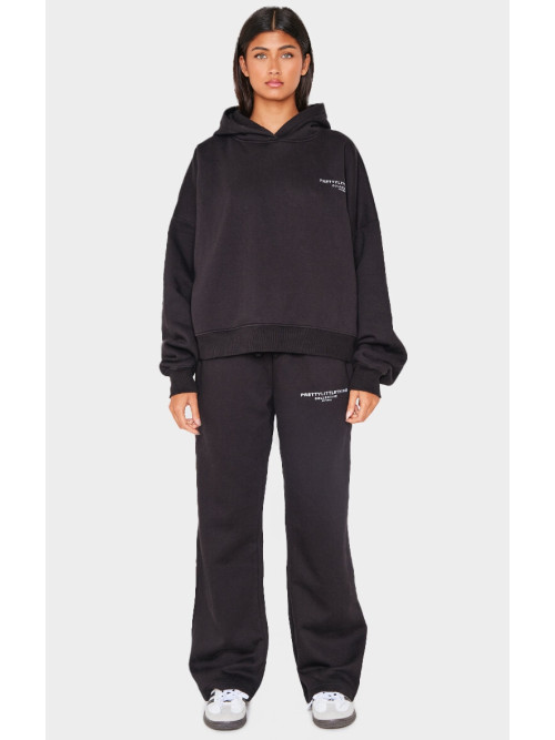 Чорні широкі джоггери з колективним принтом PRETTYLITTLETHING