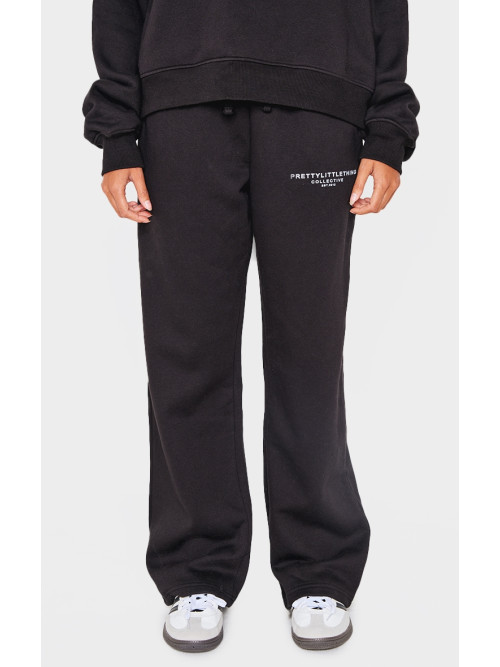 Чорні широкі джоггери з колективним принтом PRETTYLITTLETHING