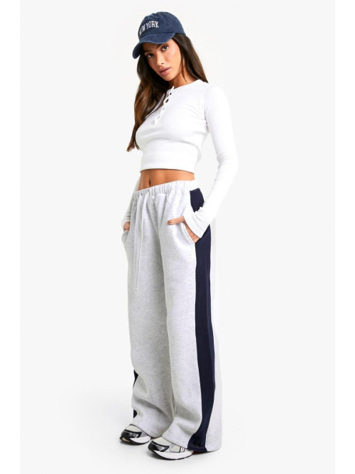Маленькі джоггери з боковими смугами і широкими штанинами