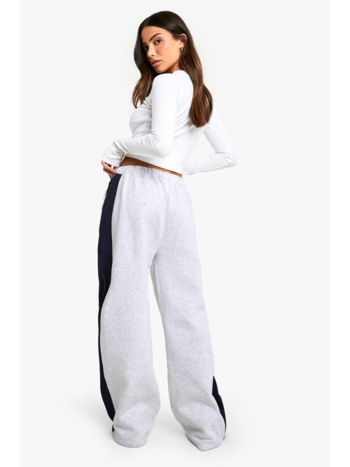 Маленькі джоггери з боковими смугами і широкими штанинами