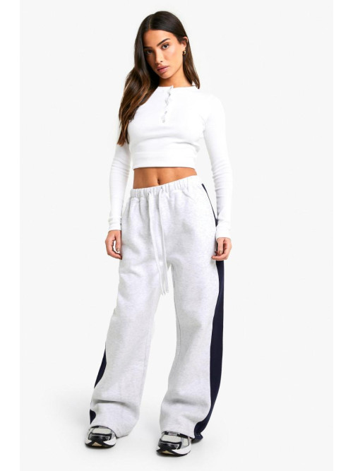 Маленькі джоггери з боковими смугами і широкими штанинами