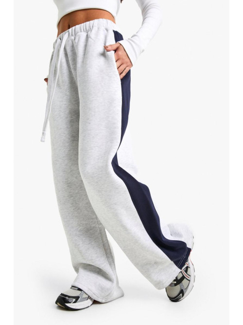 Маленькі джоггери з боковими смугами і широкими штанинами