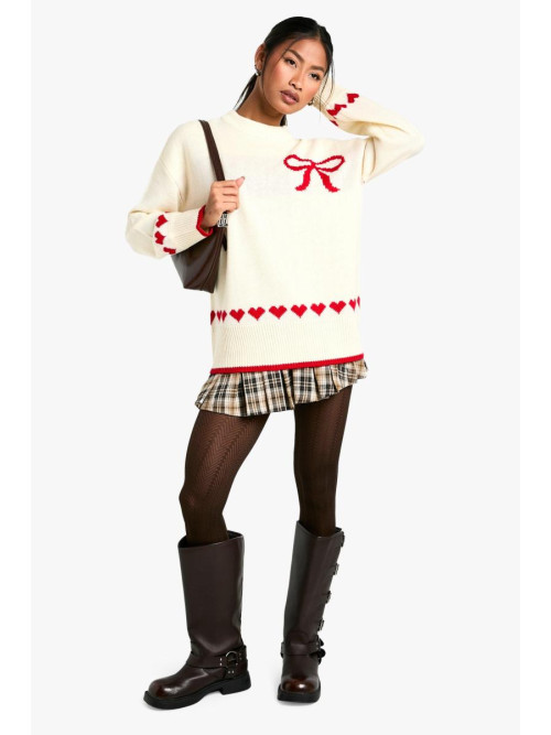 Величезний різдвяний джемпер із сердечками та бантом